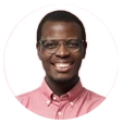 Person wearing a pink shirt for testimonials